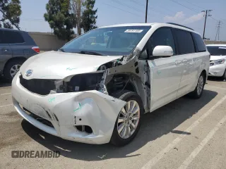 2015 Toyota Sienna XLE с VIN 5TDYK3DC3FS665984, выставлен на аукционе Copart как лот 59791105 с пробегом 131 097 миль миль и Списание • Salvage title. История ставок и продаж доступна на DreamBid. Изображение 1.