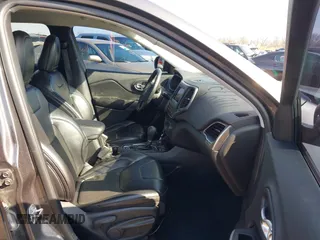 2019 Jeep Cherokee Latitude Plus with VIN 1C4PJMLBXKD162570, listed as a IAAI auction lot 41897313 with 142,110 mi miles. Bid and sale history available at carsss.com. Image 5.