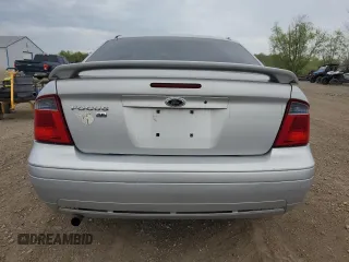 2007 Ford Focus S z VIN 1FAFP34N97W236303, wystawiony jako Copart lot #55248765 z przebiegiem 125 900 mil mil oraz Szkoda całkowita • Salvage title. Historia ofert i sprzedaży dostępna na DreamBid. Obrazek 6.