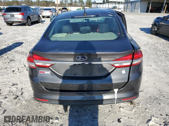 2017 Ford Fusion SE z VIN 3FA6P0H71HR150451, wystawiony jako Copart lot #46283505 z przebiegiem 148 702 mil mil oraz Szkoda całkowita • Salvage title. Historia ofert i sprzedaży dostępna na DreamBid. Obrazek 6.