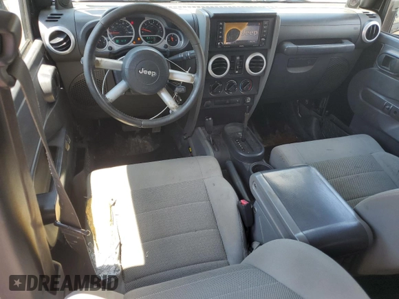 2008 Jeep Wrangler Unlimited Sahara with VIN 1J4GA59178L501668, listed as a Copart auction lot 63586375 with 213,562 mi miles and Clean title. Bid and sale history available at DreamBid. Image 8.