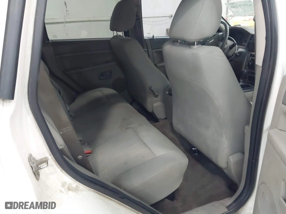 2006 Jeep Grand Cherokee Laredo with VIN 1J8GR48K06C163877, listed as a IAAI auction lot 41971240 with 250,544 mi miles. Bid and sale history available at carsss.com. Image 8.