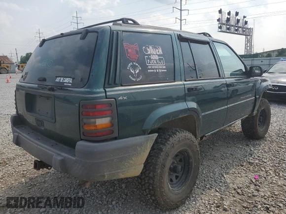 1997 Jeep Grand Cherokee Laredo with VIN 1J4GZ58SXVC595012, listed as a Copart auction lot 59746655 with Not provided miles and Salvage title. Bid and sale history available at DreamBid. Image 3.