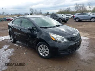 2013 Kia Rio LX with VIN KNADM4A39D6210988, listed as a IAAI auction lot 41875368 with 161,570 mi miles. Bid and sale history available at carsss.com. Image 1.