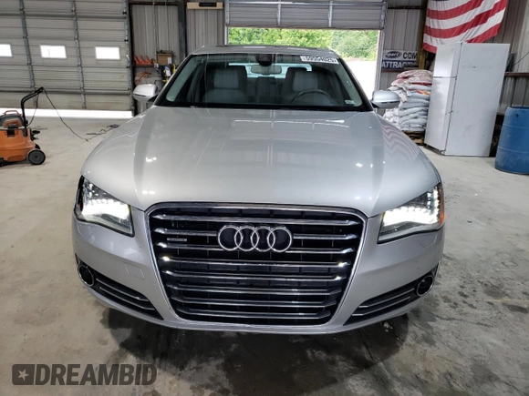 2012 Audi A8 z VIN WAURVAFD4CN038599, wystawiony jako Copart lot #59554025 z przebiegiem 93 334 mil mil oraz Szkoda całkowita • Salvage title. Historia ofert i sprzedaży dostępna na DreamBid. Obrazek 5.