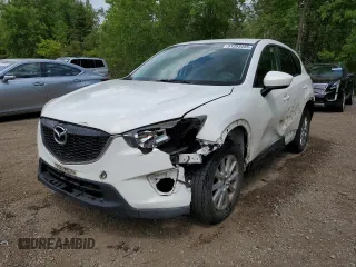 2014 Mazda CX-5 Sport with VIN JM3KE2BE2E0428598, listed as a Copart auction lot 61283485 with 209,522 mi miles and Salvage title. Bid and sale history available at DreamBid. Image 1.