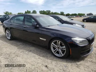 2012 BMW 7 Series 740Li with VIN WBAKB4C5XCC576227, listed as a Copart auction lot 52946135 with 154,611 mi miles and Salvage Title. Bid and sale history available at carsss.com. Image 4.