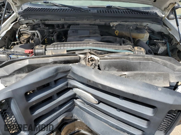2007 Ford F-250 XL with VIN 1FTNF21577EA03016, listed as a Copart auction lot 65727204 with 132,073 mi miles and Salvage Title. Bid and sale history available at DreamBid. Image 11.
