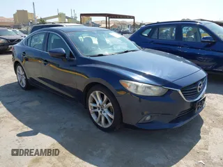 2015 Mazda 6 i Touring with VIN JM1GJ1V53F1207653, listed as a IAAI auction lot 42464679 with 192,025 mi miles and . Bid and sale history available at DreamBid. Image 1.