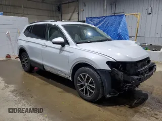 2018 Volkswagen Tiguan SEL with VIN 3VV2B7AX9JM197161, listed as a Copart auction lot 59836195 with 111,195 mi miles and Salvage title. Bid and sale history available at DreamBid. Image 4.