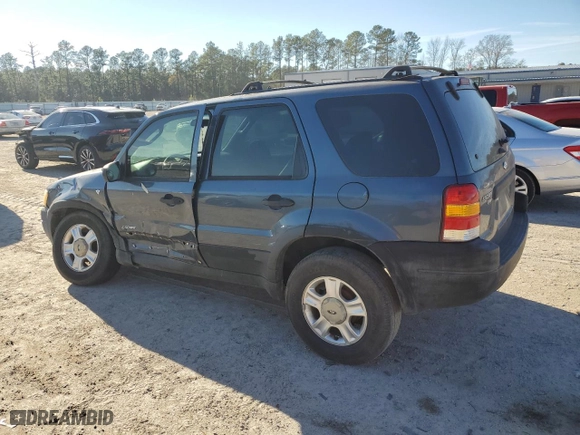 2001 Ford Escape XLT with VIN 1FMYU03171KB12159, listed as a Copart auction lot 87974165 with 0 mi miles and Salvage Title. Bid and sale history available at carsss.com. Image 2.