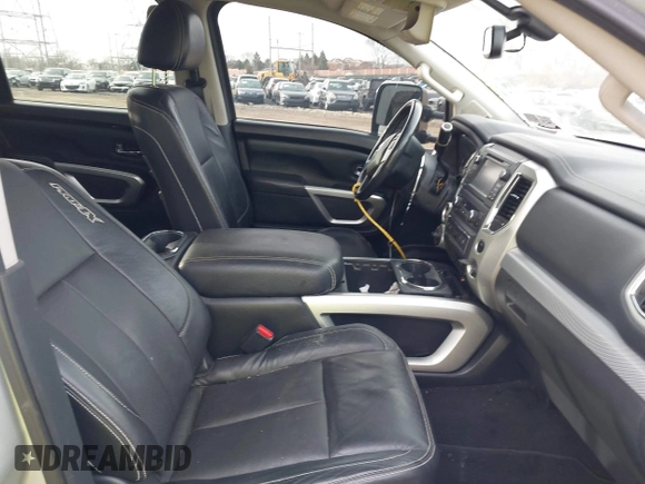 2017 Nissan Titan SL z VIN 1N6AA1E58HN506456, wystawiony jako IAAI lot #41521294 z przebiegiem 59 252 mil mil oraz . Historia ofert i sprzedaży dostępna na DreamBid. Obrazek 5.
