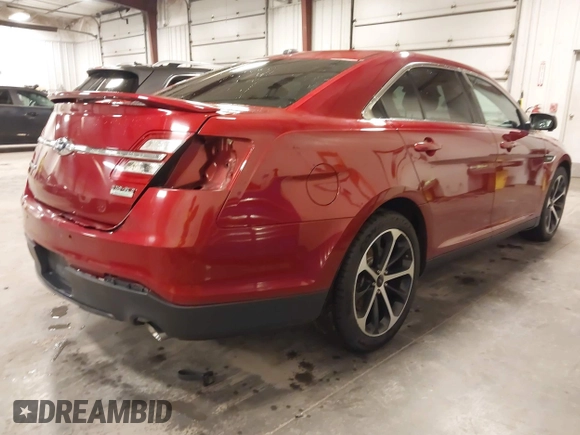2014 Ford Taurus SHO with VIN 1FAHP2KT9EG130834, listed as a IAAI auction lot 41748199 with 98,857 mi miles and . Bid and sale history available at carsss.com. Image 4.