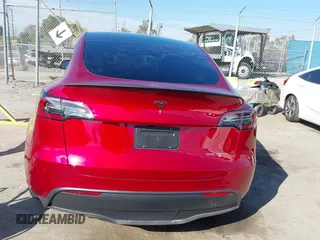 2024 Tesla Model Y Performance with VIN 7SAYGDEF3RF032980, listed as a IAAI auction lot 41619450 with 12,105 mi miles and . Bid and sale history available at DreamBid. Image 16.