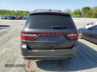 2018 Dodge Durango SXT с VIN 1C4RDJAG9JC359800, выставлен на аукционе Copart как лот 52737065 с пробегом 171 202 миль миль и Списание • Salvage title. История ставок и продаж доступна на DreamBid. Изображение 6.