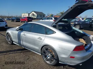 2014 Audi S7 Prestige with VIN WAUW2AFC6EN140766, listed as a IAAI auction lot 41780769 with 101,318 mi miles. Bid and sale history available at carsss.com. Image 3.