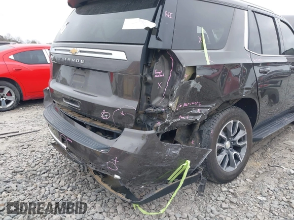 2021 Chevrolet Tahoe LT with VIN 1GNSCNKD7MR439900, listed as a IAAI auction lot 41187590 with 119,131 mi miles and . Bid and sale history available at DreamBid. Image 6.