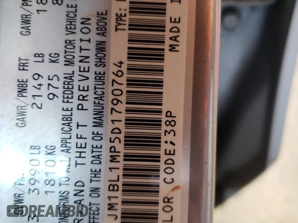 2013 Mazda 3 i Grand Touring with VIN JM1BL1MP5D1790764, listed as a Copart auction lot 57269495 with 105,604 mi miles and Salvage title. Bid and sale history available at DreamBid. Image 12.