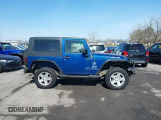 2009 Jeep Wrangler X with VIN 1J4FA24169L739367, listed as a IAAI auction lot 41810359 with 193,192 mi miles and . Bid and sale history available at carsss.com. Image 13.