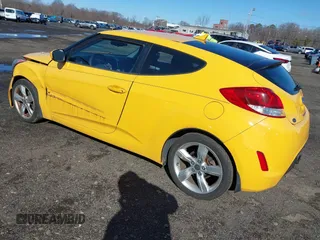 2012 Hyundai Veloster w/Black Int with VIN KMHTC6ADXCU042788, listed as a IAAI auction lot 41854662 with 90,500 mi miles. Bid and sale history available at carsss.com. Image 3.