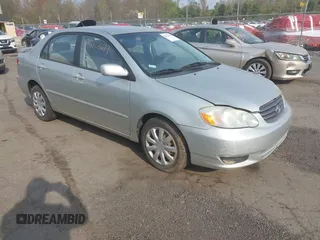 2003 Toyota Corolla CE with VIN JTDBR32E930004139, listed as a IAAI auction lot 42113619 with 209,120 mi miles. Bid and sale history available at carsss.com. Image 1.