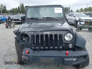 2015 Jeep Wrangler Unlimited Rubicon Hard Rock with VIN 1C4HJWFG6FL757421, listed as a IAAI auction lot 42107514 with 63,997 mi miles and . Bid and sale history available at DreamBid. Image 13.