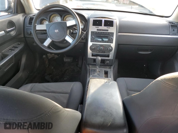 2010 Dodge Charger with VIN 2B3CA4CD7AH217513, listed as a Copart auction lot 83057924 with 67,561 mi miles and Salvage Title. Bid and sale history available at carsss.com. Image 8.