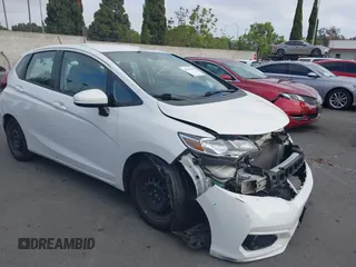 2019 Honda Fit LX z VIN 3HGGK5H48KM731113, wystawiony jako IAAI lot #42261905 z przebiegiem 61 431 mil mil oraz . Historia ofert i sprzedaży dostępna na DreamBid. Obrazek 1.