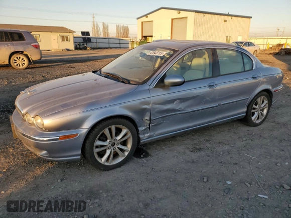 2007 Jaguar X-Type z VIN SAJWA51A27WJ21259, wystawiony jako Copart lot #42643115 z przebiegiem 106 800 mil mil oraz Szkody całkowita. Historia ofert i sprzedaży dostępna na DreamBid. Obrazek 1.