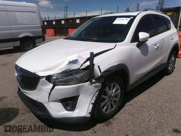 2014 Mazda CX-5 Touring with VIN JM3KE2CY7E0364311, listed as a IAAI auction lot 42108176 with 90,506 mi miles and . Bid and sale history available at DreamBid. Image 6.