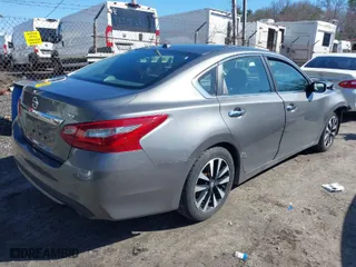 2018 Nissan Altima 2.5 S with VIN 1N4AL3AP8JC212143, listed as a IAAI auction lot 39141988 with 104,351 mi miles. Bid and sale history available at carsss.com. Image 4.