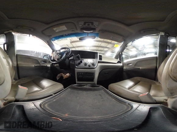 2015 Toyota Sienna XLE with VIN 5TDYK3DC3FS677780, listed as a IAAI auction lot 42155459 with 102,355 mi miles. Bid and sale history available at carsss.com. Image 18.