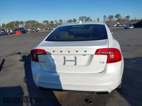 2015 Volvo S60 T5 Drive-E Premier Plus with VIN YV140MFC6F1314534, listed as a IAAI auction lot 41348374 with 81,235 mi miles. Bid and sale history available at carsss.com. Image 16.