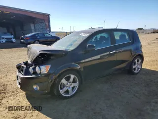 2012 Chevrolet Sonic LTZ z VIN 1G1JE6SH5C4195594, wystawiony jako Copart lot #88336435 z przebiegiem 105 112 mil mil oraz Szkoda całkowita • Salvage title. Historia ofert i sprzedaży dostępna na DreamBid. Obrazek 1.