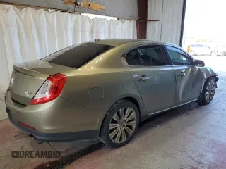2013 Lincoln MKS EcoBoost with VIN 1LNHL9FT2DG604657, listed as a Copart auction lot 65357735 with 133,548 mi miles and Salvage title. Bid and sale history available at DreamBid. Image 3.