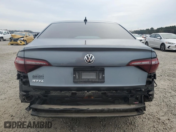 2021 Volkswagen Jetta S z VIN 3VWC57BUXMM004421, wystawiony jako Copart lot #81518974 z przebiegiem 98 518 mil mil oraz Szkoda całkowita • Salvage title. Historia ofert i sprzedaży dostępna na DreamBid. Obrazek 6.