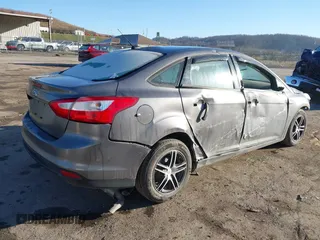 2013 Ford Focus S with VIN 1FADP3E23DL288244, listed as a IAAI auction lot 41777824 with 145,684 mi miles. Bid and sale history available at carsss.com. Image 4.