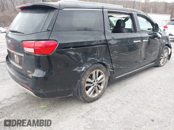 2016 Kia Sedona SX-L with VIN KNDME5C13G6184930, listed as a IAAI auction lot 41385207 with 136,447 mi miles and . Bid and sale history available at carsss.com. Image 4.
