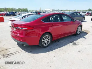 2020 Ford Fusion SE z VIN 3FA6P0HD8LR104422, wystawiony jako IAAI lot #42092244 z przebiegiem 55 438 mil mil oraz . Historia ofert i sprzedaży dostępna na DreamBid. Obrazek 4.