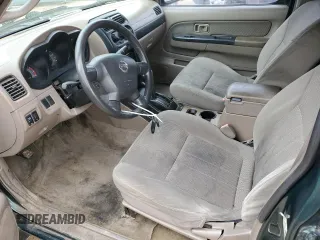 2002 Nissan Frontier SE with VIN 1N6ED27T42C378228, listed as a Copart auction lot 50562975 with 287,368 mi miles and Salvage title. Bid and sale history available at DreamBid. Image 7.