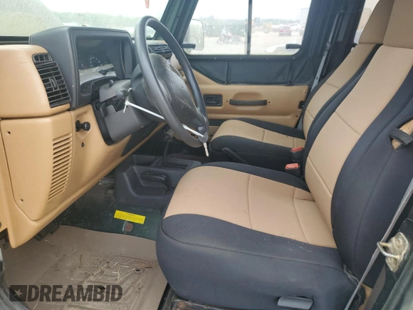 1998 Jeep Wrangler SE with VIN 1J4FY29P8WP784825, listed as a Copart auction lot 61581205 with 148,152 mi miles and Clean title. Bid and sale history available at DreamBid. Image 7.