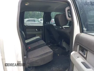 2014 Ford F-150 XL with VIN 1FTFW1EF9EFC63944, listed as a IAAI auction lot 42214453 with 252,127 mi miles and . Bid and sale history available at DreamBid. Image 8.