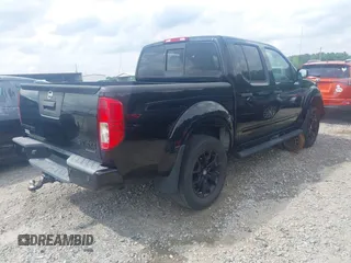 2018 Nissan Frontier SV with VIN 1N6AD0EV0JN744891, listed as a IAAI auction lot 42128481 with 137,412 mi miles and . Bid and sale history available at DreamBid. Image 4.