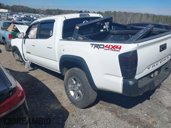 2018 Toyota Tacoma SR with VIN 5TFCZ5AN6JX144056, listed as a IAAI auction lot 41623760 with Not Provided miles and . Bid and sale history available at DreamBid. Image 3.
