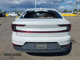 2022 Polestar 2 z VIN LPSED3KA8NL079546, wystawiony jako IAAI lot #41743211 z przebiegiem 26 509 mil mil oraz . Historia ofert i sprzedaży dostępna na DreamBid. Obrazek 16.
