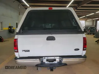2001 Ford F-150 XL with VIN 1FTRX17L51NB25752, listed as a Copart auction lot 48721235 with 179,941 mi miles and Salvage title. Bid and sale history available at DreamBid. Image 6.