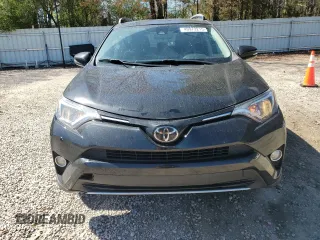 2018 Toyota RAV4 XLE with VIN 2T3WFREV7JW412348, listed as a Copart auction lot 49973215 with 127,661 mi miles and Salvage Title. Bid and sale history available at DreamBid. Image 5.