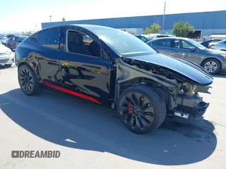 2023 Tesla Model Y Performance z VIN 7SAYGDEF5PF793197, wystawiony jako IAAI lot #41807155 z przebiegiem 21 613 mil mil oraz . Historia ofert i sprzedaży dostępna na DreamBid. Obrazek 1.