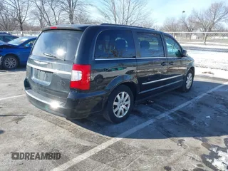 2016 Chrysler Town & Country Touring with VIN 2C4RC1BG7GR231704, listed as a IAAI auction lot 41306140 with 165,890 mi miles. Bid and sale history available at carsss.com. Image 4.