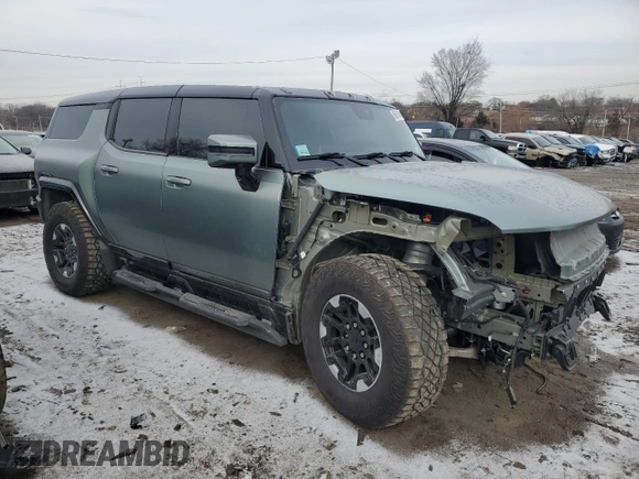 2024 GMC Hummer EV 3X z VIN 1GKB0RDC6RU101989, wystawiony jako Copart lot #85671314 z przebiegiem 7434 mil mil oraz Szkody całkowita. Historia ofert i sprzedaży dostępna na DreamBid. Obrazek 4.